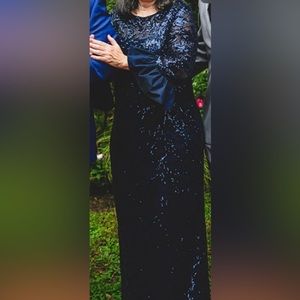 Teri Jon by Rickie Freeman navy sequin gown with satin bell cuffs